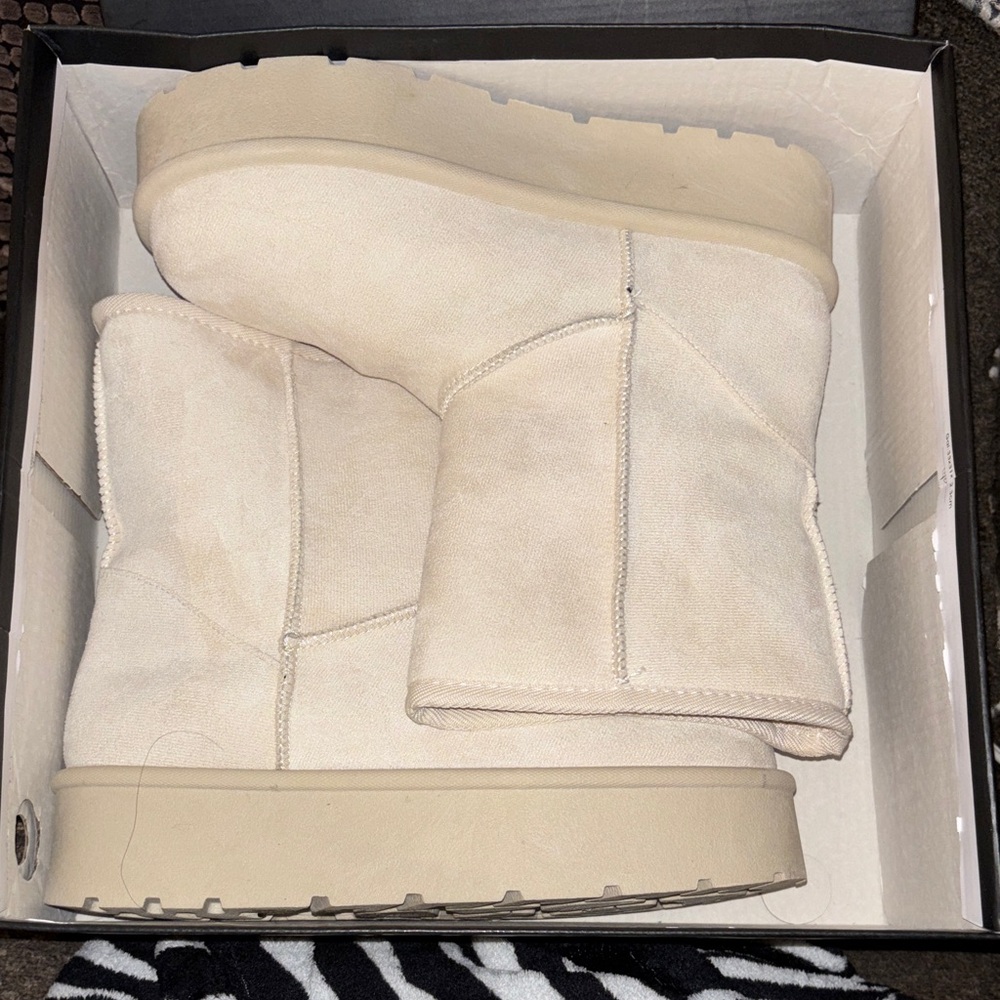 Extreme by Eddie Marc beige boots